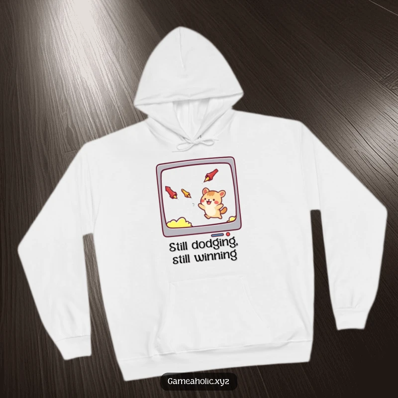 Funny hoodie depicting a cute animal character masterfully dodging falling projectiles on a video game screen, a warm and humorous gift.